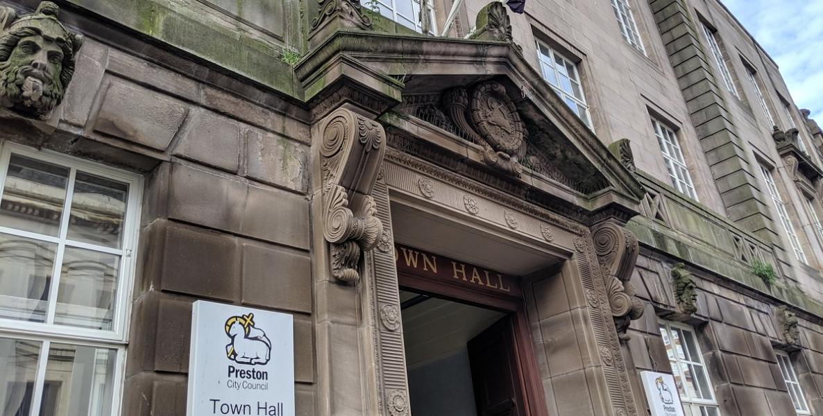 Town Hall entrance close up of sign and stonework from the side