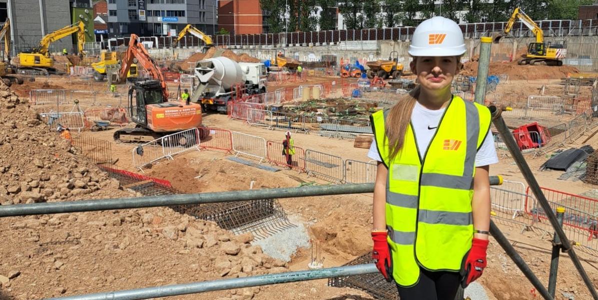 Work experience girl on building site