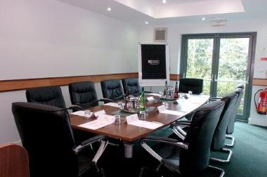 Meeting room set up with flip chart inside Preston International Hotel